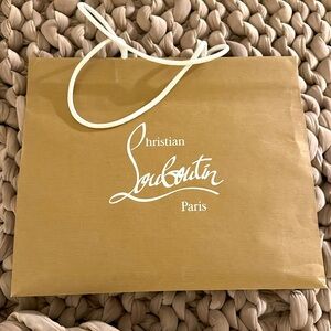 Louboutin shopping bag, fits a large shoe box (boot size)